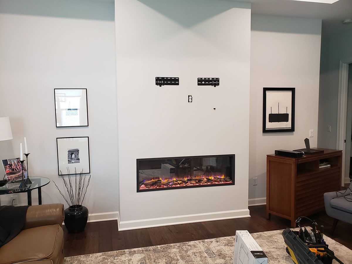 A living room with a fireplace and a couch