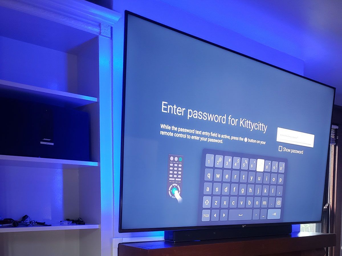 A large flat screen tv with a keyboard on it