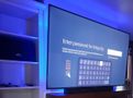 A large flat screen tv with a keyboard on it