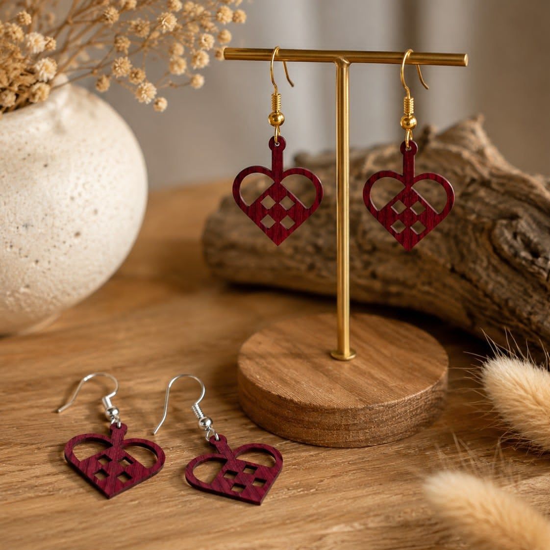 By Sandager, Rinkøbing, Denmark
HEART SHAPED LASER CUT EARRINGS IN DARK RED WOOD FROM 1.5 MM (millimeter) BIRCH VENEER 
Inspired by the classic Christmas heart but can be worn all year. 
Available in either silver or gold covered steel - nickel free
Length app. 1.5