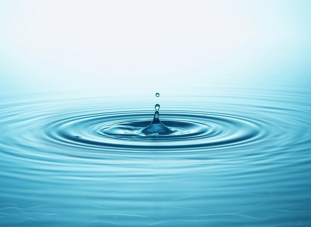 Blue Water Droplet Splashing Into Calm Water — Rainman Domestic Water In Avoca, QLD