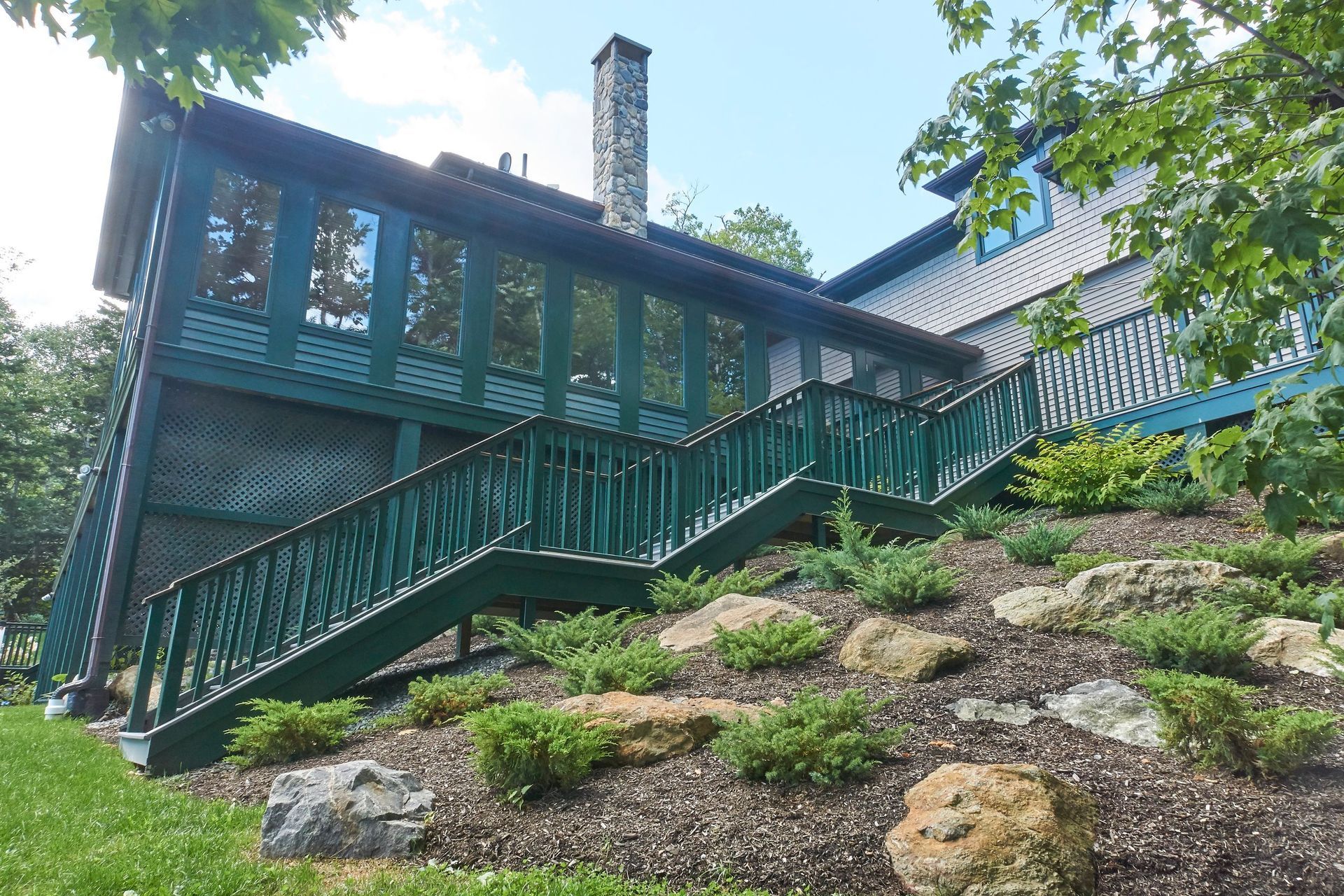An addition to a house with stairs leading up to the second floor