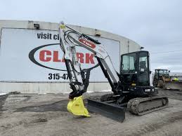 Whitecap Builders used a compact excavator for grading and site prep at a job in Waldo, Maine.