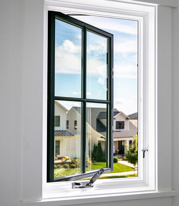 Whitecap Builders installed energy-efficient black windows during a remodel in Bayside, Maine.
