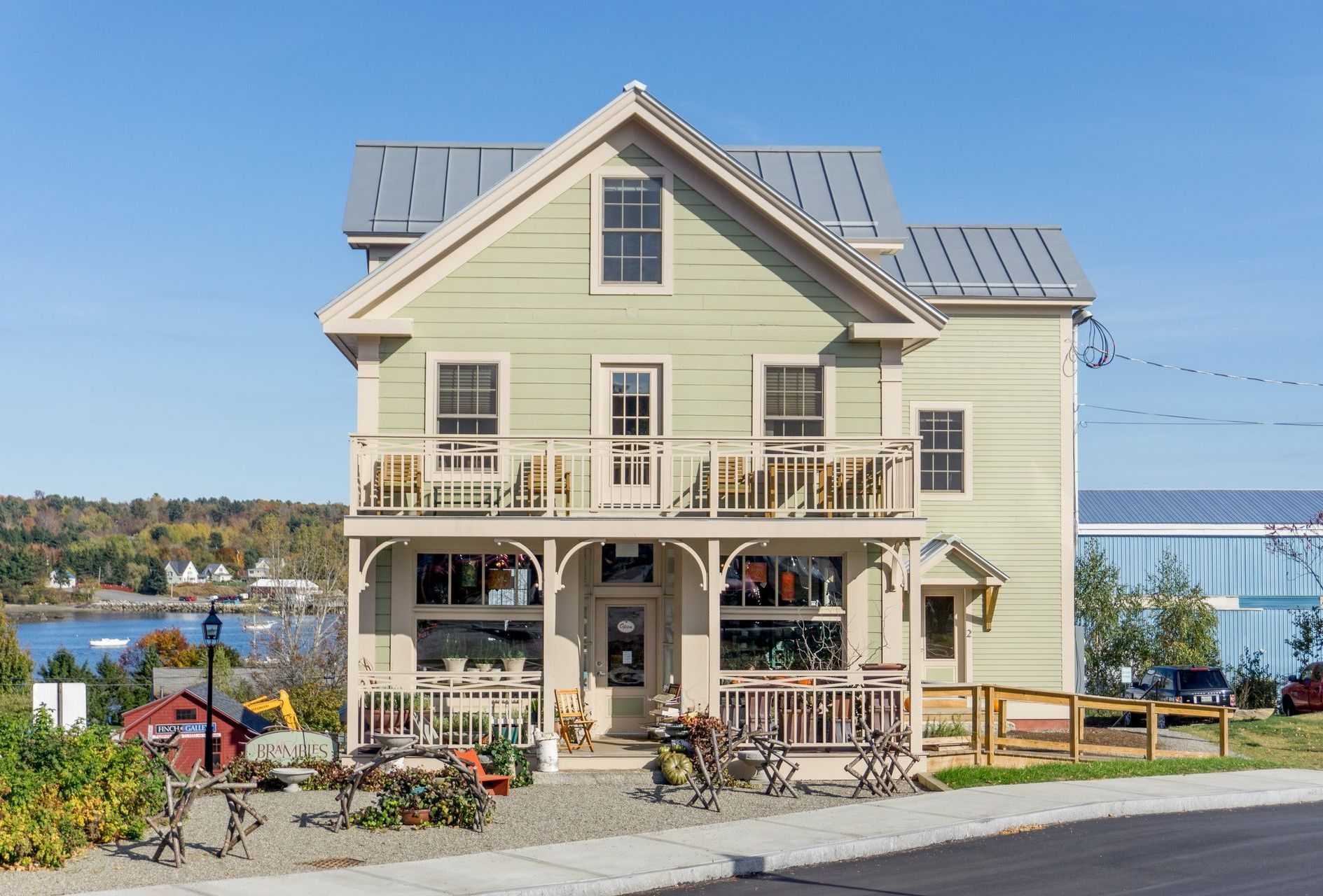 Whitecap Builders remodeled a large New England-style home with a full second-story update in Searsport, Maine.