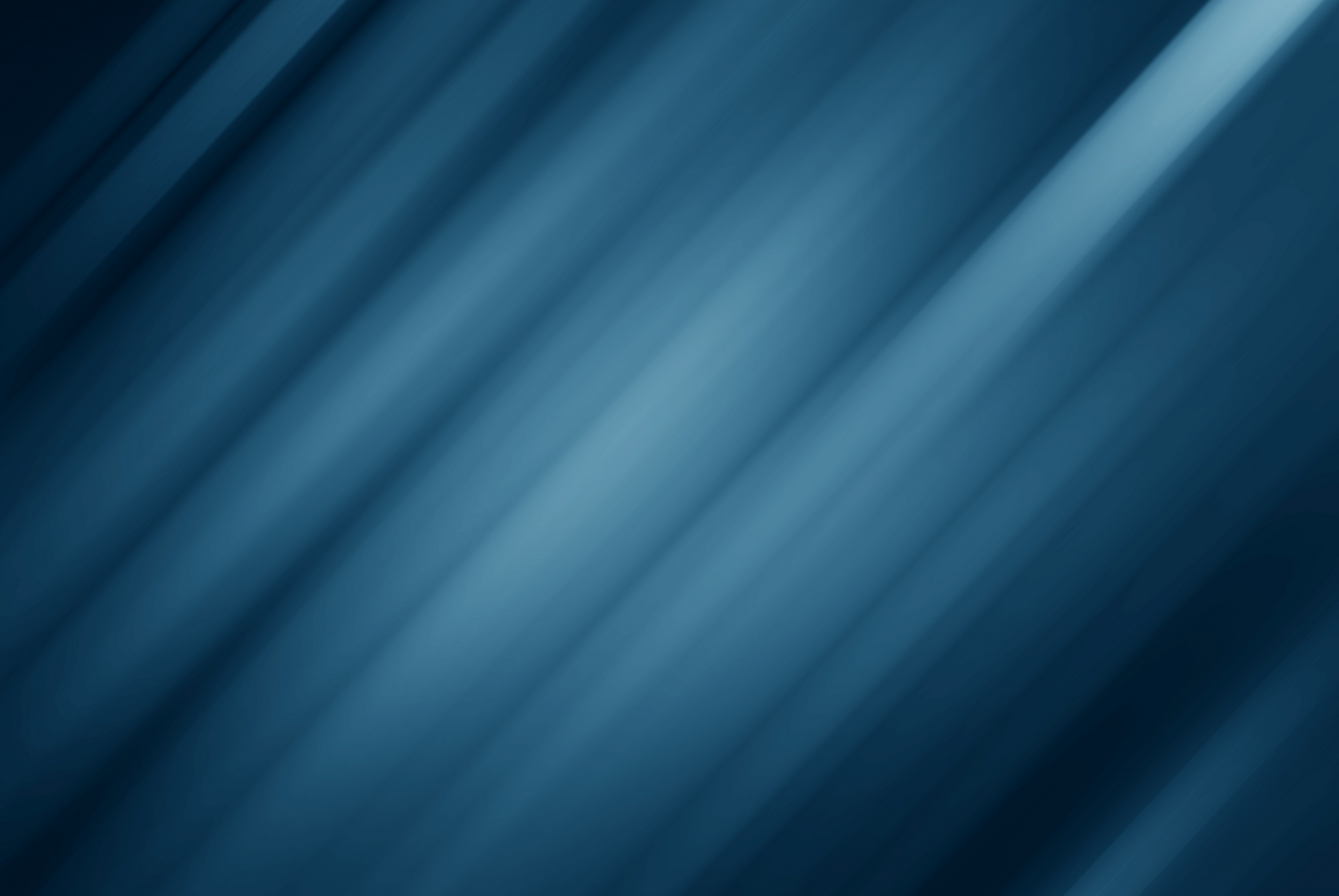 A dark blue background with a diagonal striped pattern