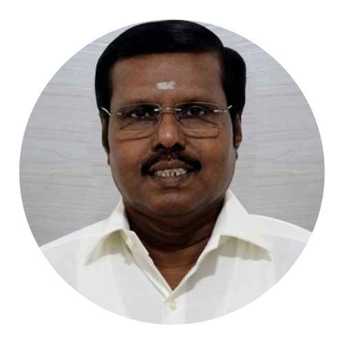 Man in white shirt and glasses with a mustache, posing against a light background.