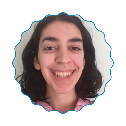 Smiling person with dark hair in a blue scalloped frame on a white background