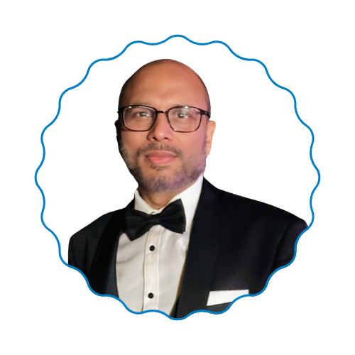 Formal portrait of a man in a black tuxedo with bow tie, framed by a blue scalloped border