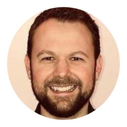 Smiling bearded man in a circular portrait on a light background
