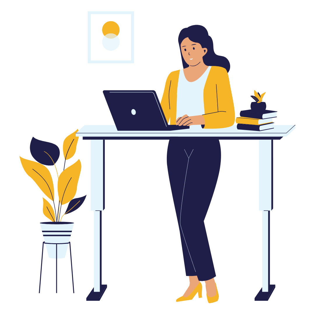 Person standing at a desk using a laptop, with a potted plant and books nearby.