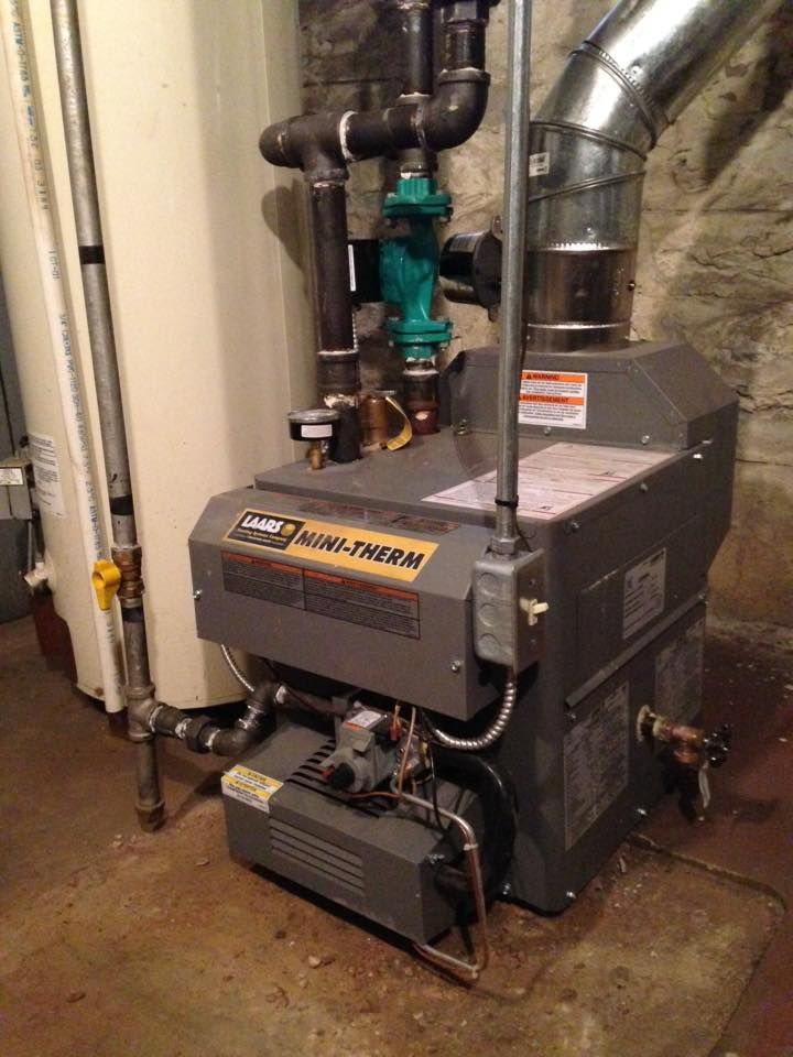 LAARS Mini-Therm gas boiler installed for energy-efficient home heating system
