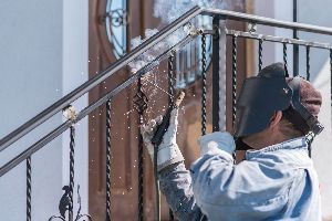 Man Welding Stair Railing — Mellman & Perdue CPAs — Oakland, CA
