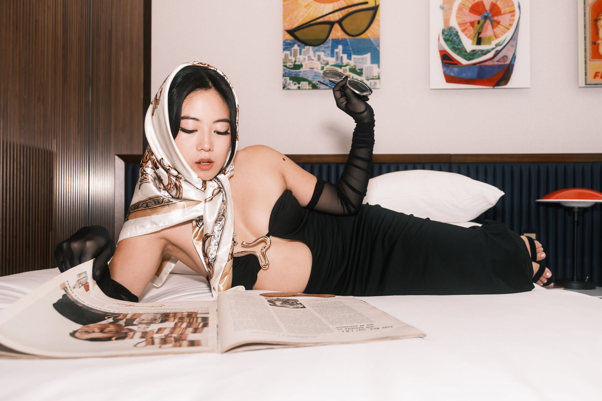 Luxury editorial model with elegant posture and narrative presence — photographed at the TWA Hotel, midcentury cinematic atmosphere — Minnie Lee.