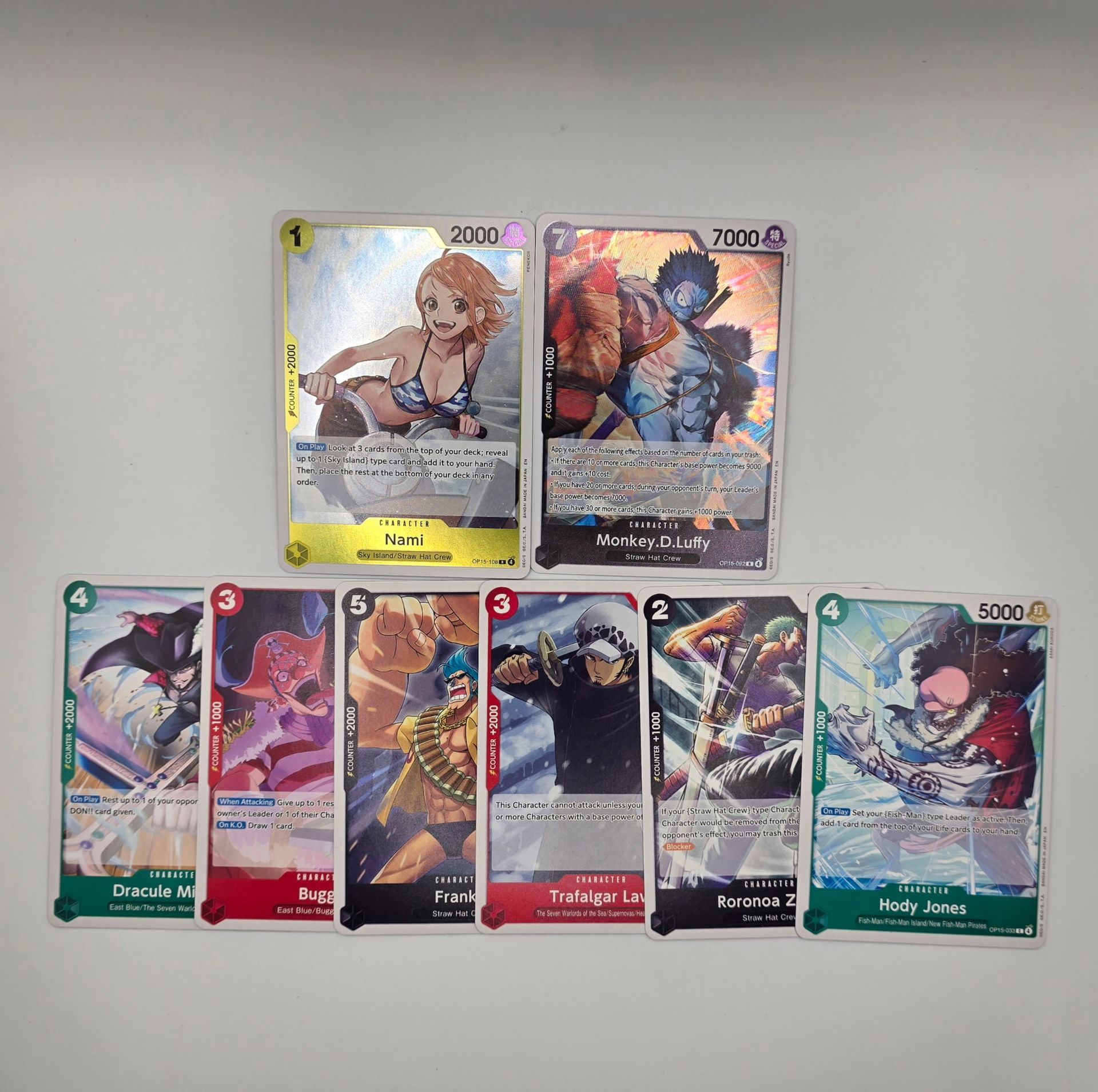 One Piece TCG Bundle-15 card total mystery bundle.   Expand your collection with every bundle of curated hand packed cards including  two Shiny cards in every bundle. Find 2 rare cards in every pack!