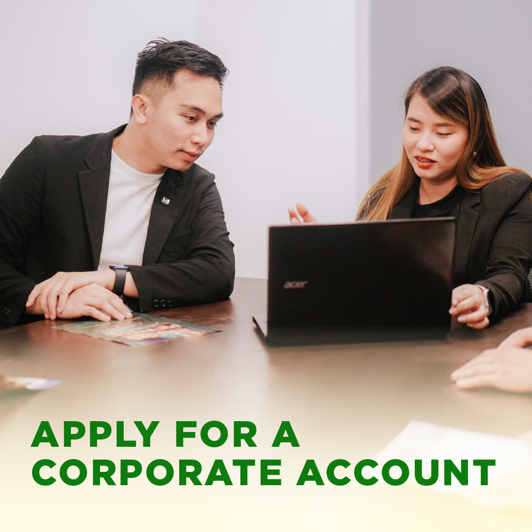 A professional assisting a guest to apply for a corporate account at Harvest Hotel, a top choice for business accommodation in Cabanatuan.