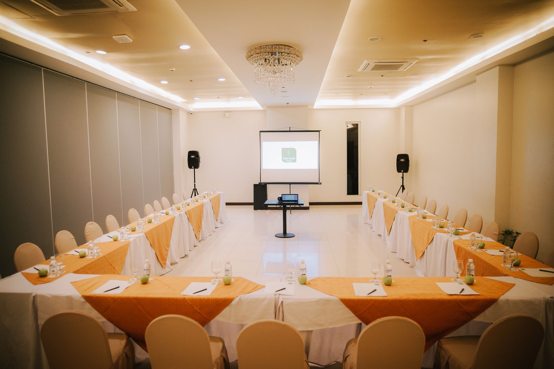 Harvest Hotel Cabanatuan modern meeting room with U-shaped setup and projec