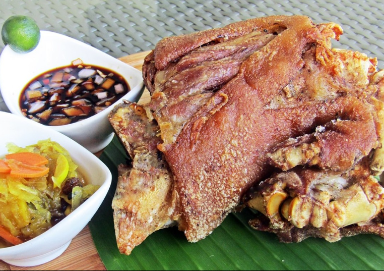 Crispy pata with dipping sauce and atchara at Harvest Hotel Cabanatuan