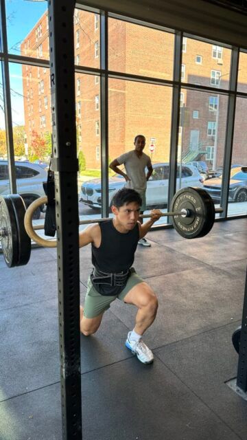Rodniel looking fierce during the second event. A member performing a step back lunge with an intense look on his face.