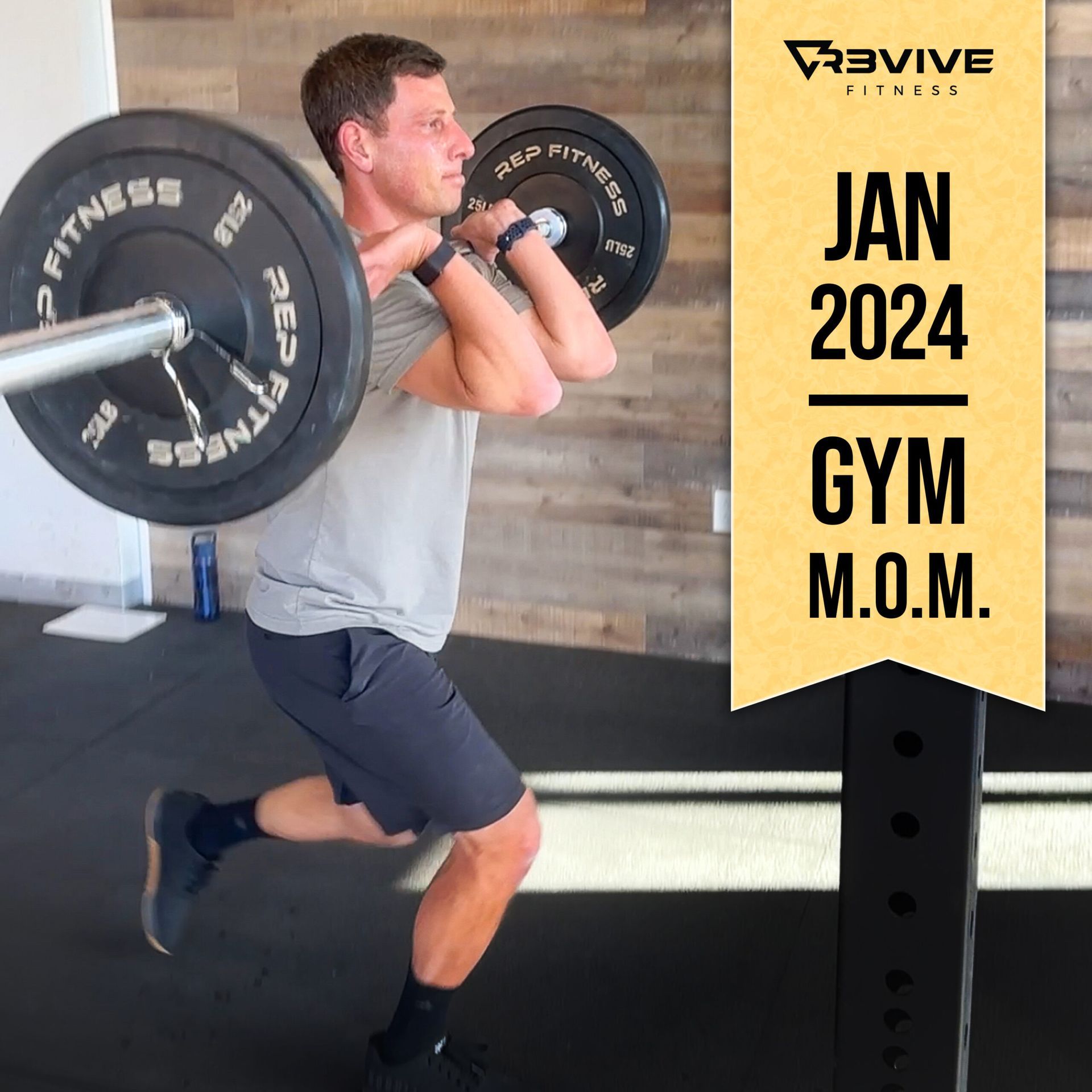 Man doing a front rack lunge in a gym, barbell on shoulders. 