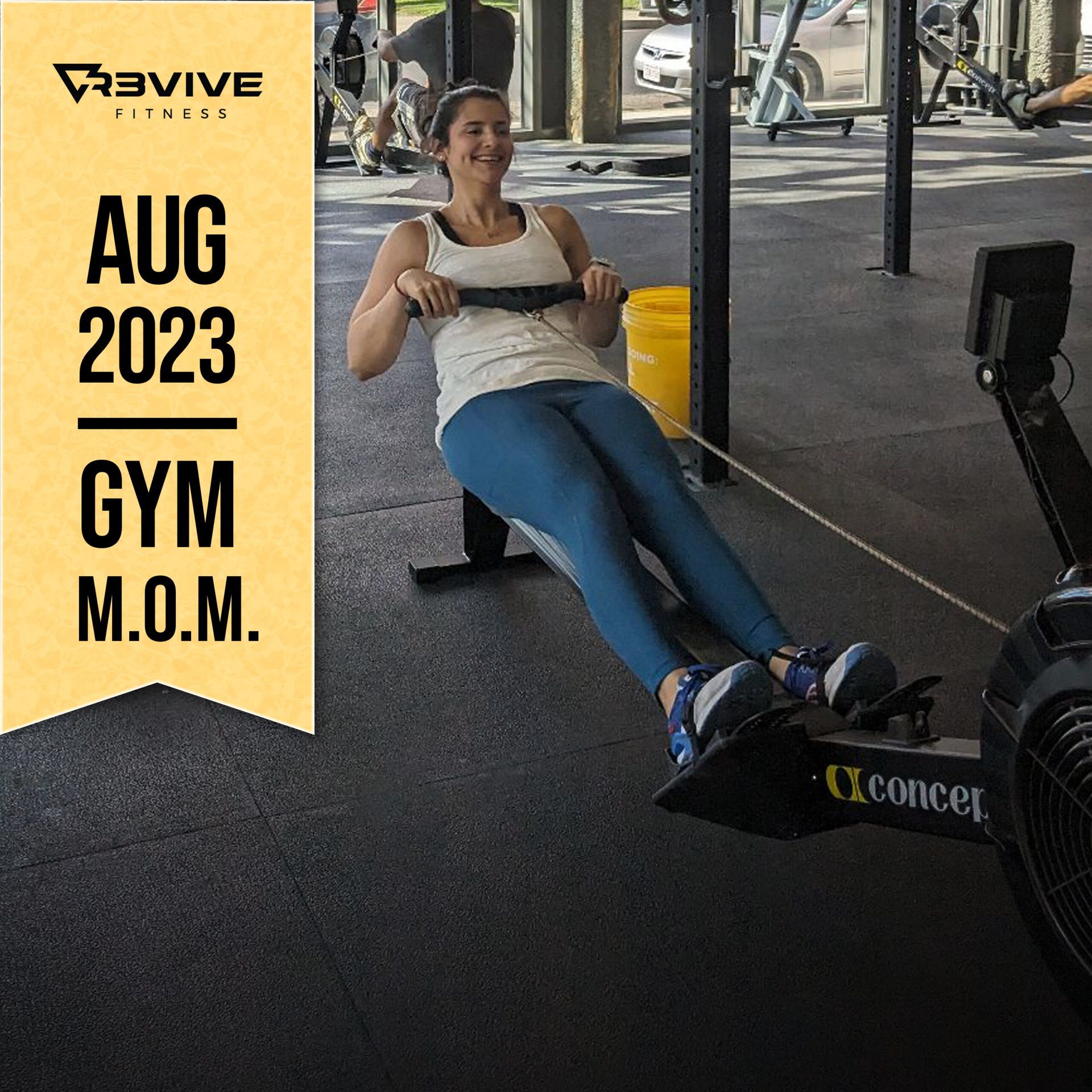 Woman rowing indoors at the gym; August 2023 