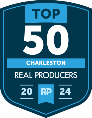 A badge that says top 50 real producers in charleston