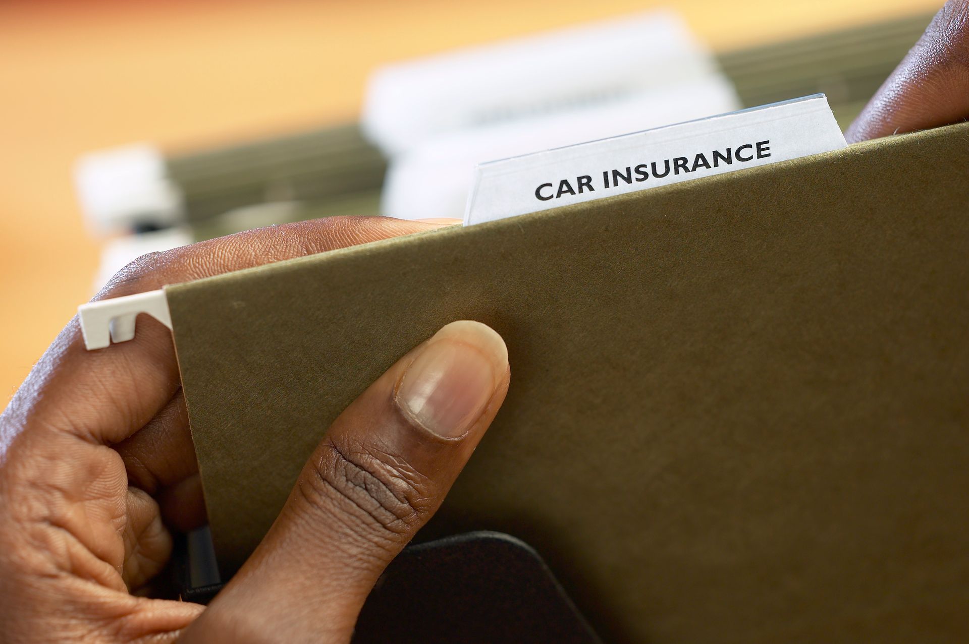 Car insurance tab on file folder at Coastcomp Insurance Agency in Diamond Bar, CA, helping clients i