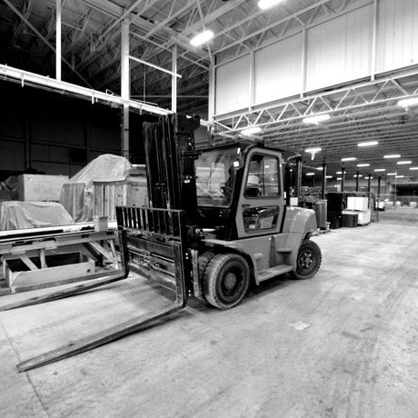 Forklift in a warehouse setting.