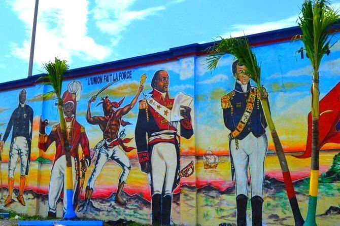 Colorful mural of four uniformed figures marching against a bright sky and desert background.