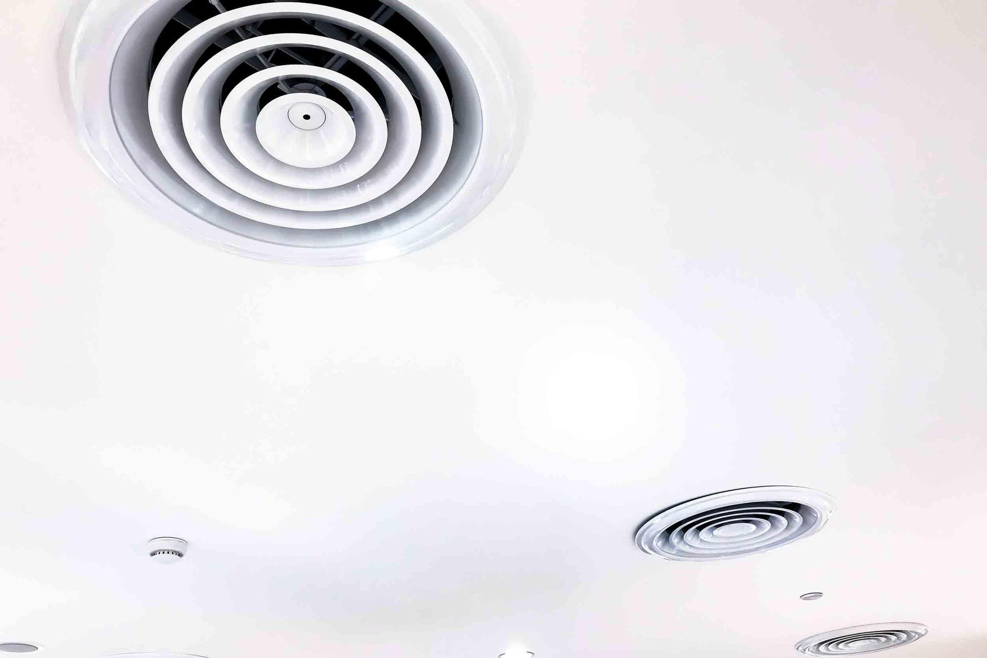A White Ceiling With a Circular Air Vent on It — The Cool Guys In Holtze, NT