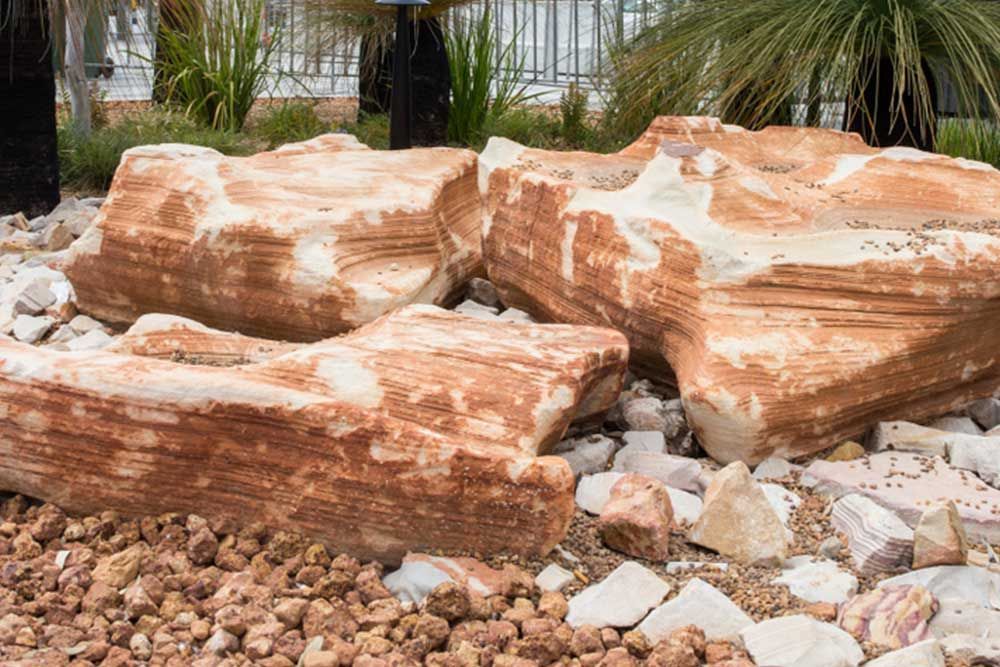 A Large Rock In A Pile Of Rocks And Gravel — Andrew Johnston Haulage In Byron Bay, NSW