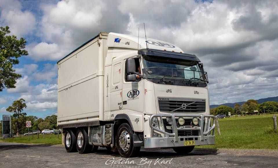 A White Volvo Truck Is Parked On The Side Of The Road — Andrew Johnston Haulage In Ballina, NSW