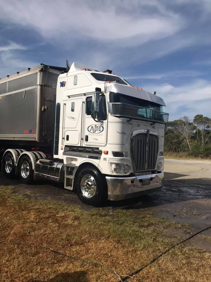A White Semi Truck With The Letters AJH On The Side — Andrew Johnston Haulage In Lismore, NSW