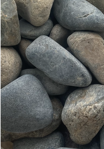A Pile of Rocks Sitting on Top of Each Other — Andrew Johnston Haulage In Ewingsdale, NSW