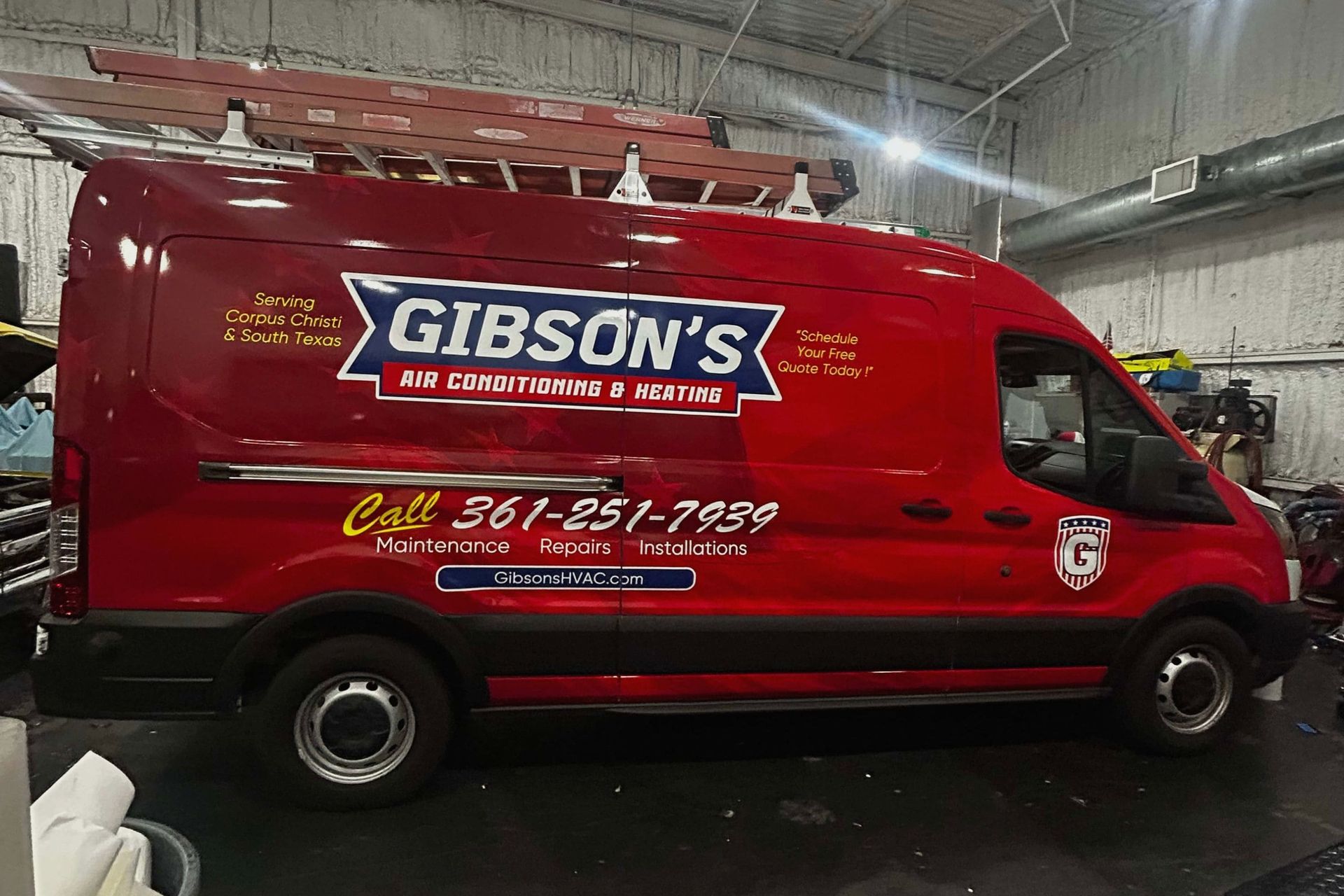 Red Gibson’s service van parked indoors in a warehouse