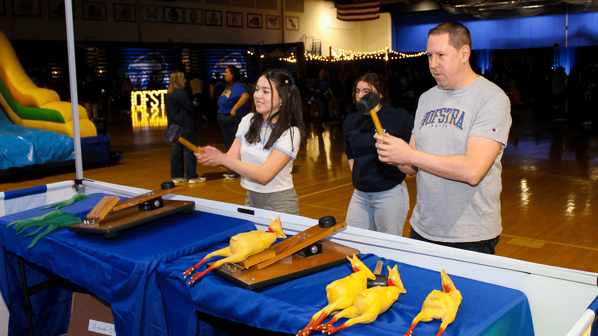 2 people playing carnival games