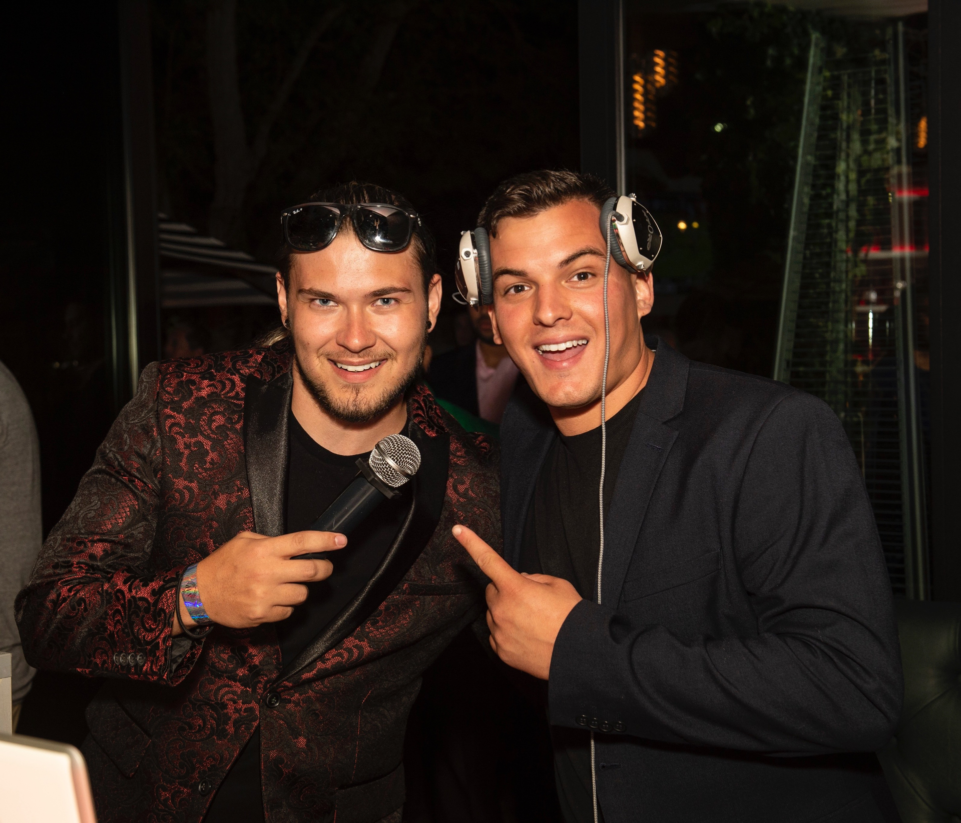DJ and MC posing together for a photo