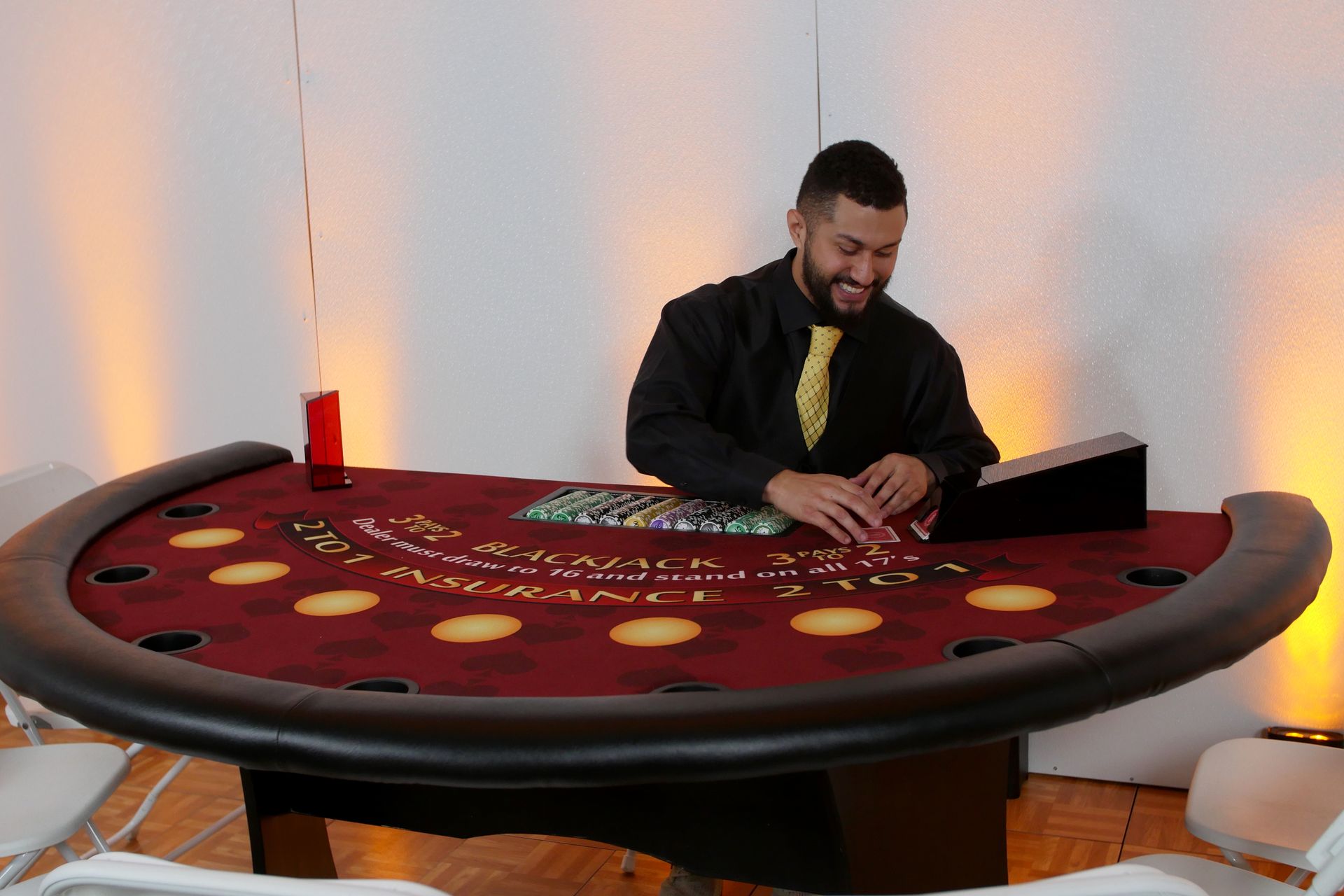 Blackjack Table with dealer laying out cards