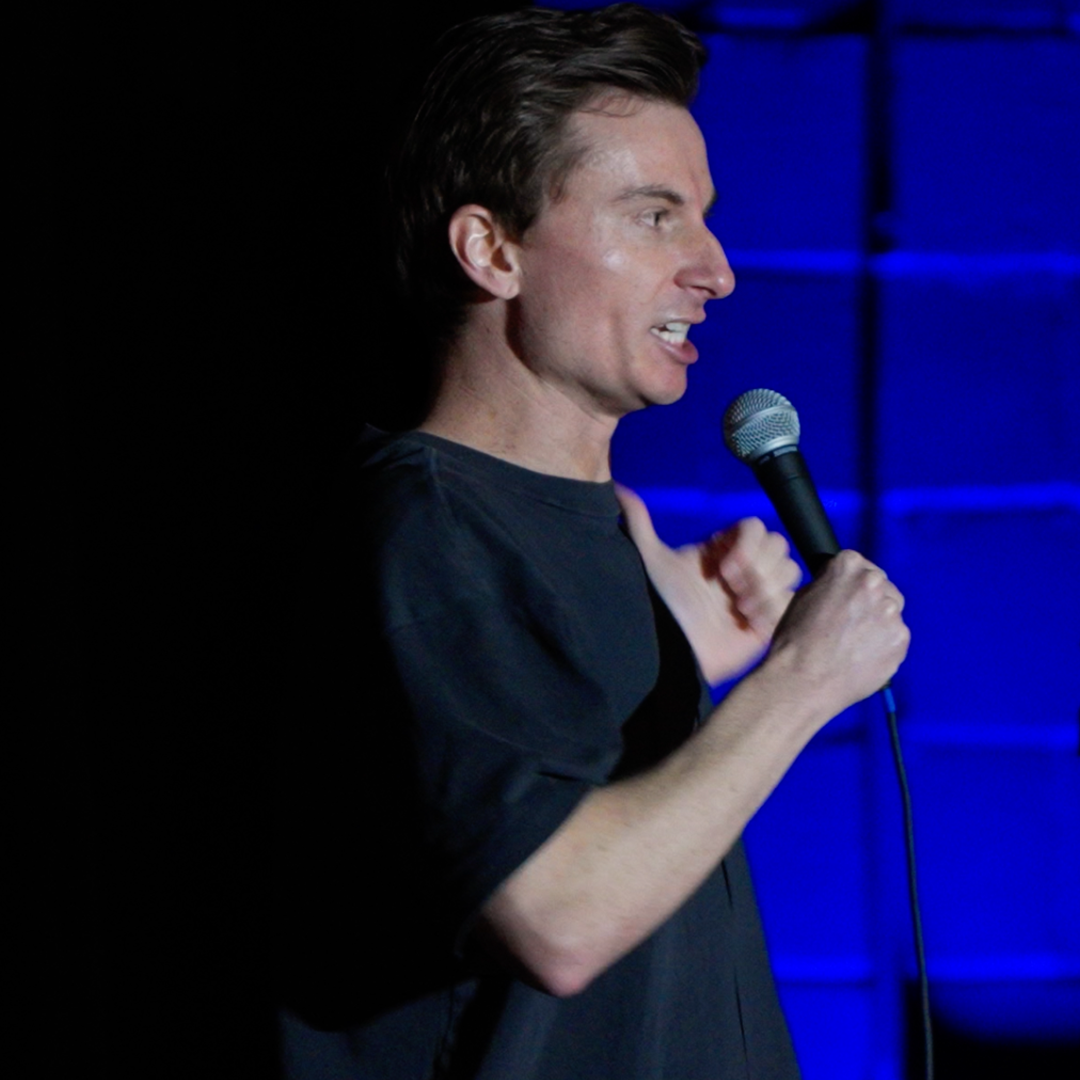 Conference Keynote Speaker with Microphone