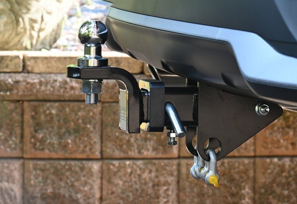 Black Metal Tow Bar Installation On The Rear Of A Car — Bomaderry Towbars & Mufflers In Bomaderry New South Wales