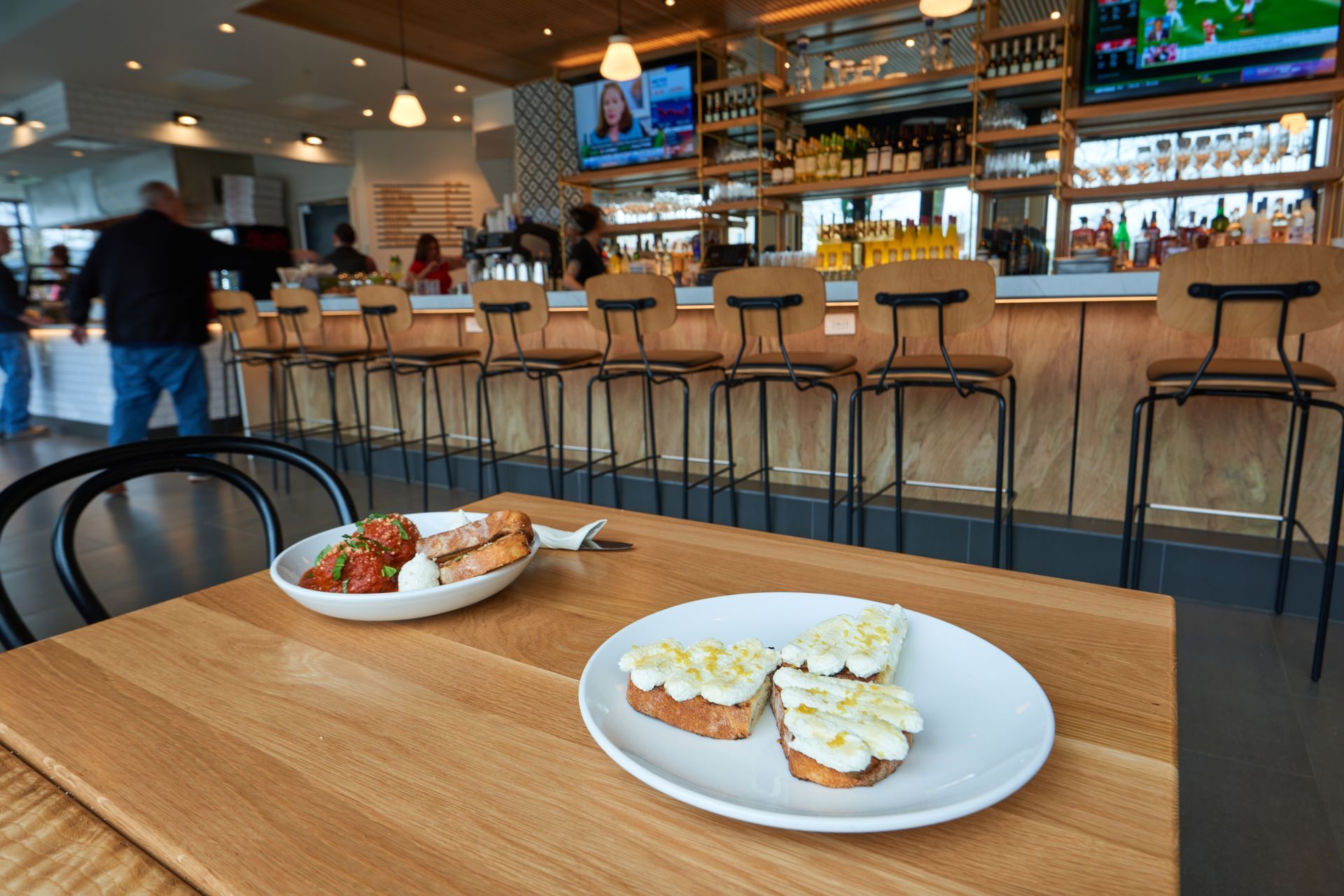 Enjoy a diverse menu, full bar, and daily specials at The Pizzeria in Bay Shore.