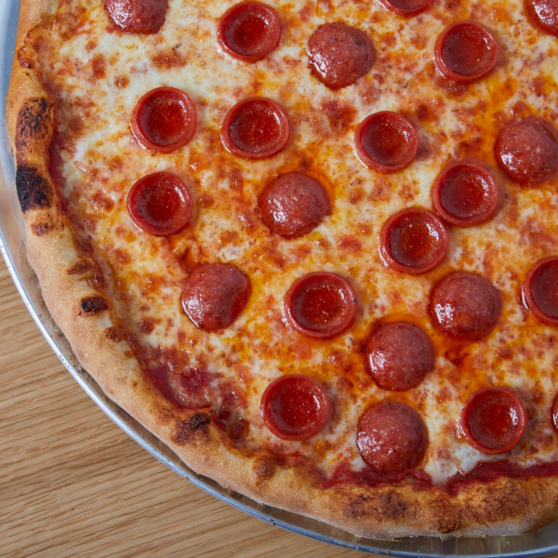 Enjoy a variety of fresh pizza at The Pizzeria, located in the Smith Haven mall in Lake Grove.