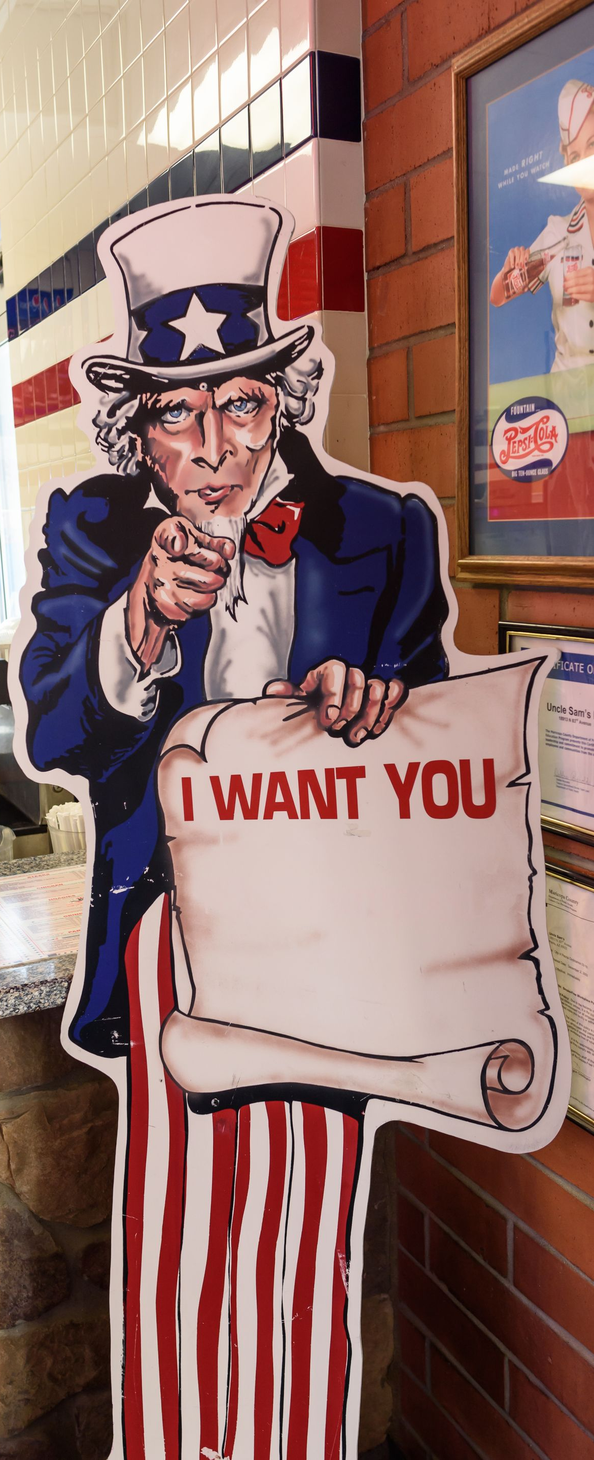 Uncle Sam cutout holding a 