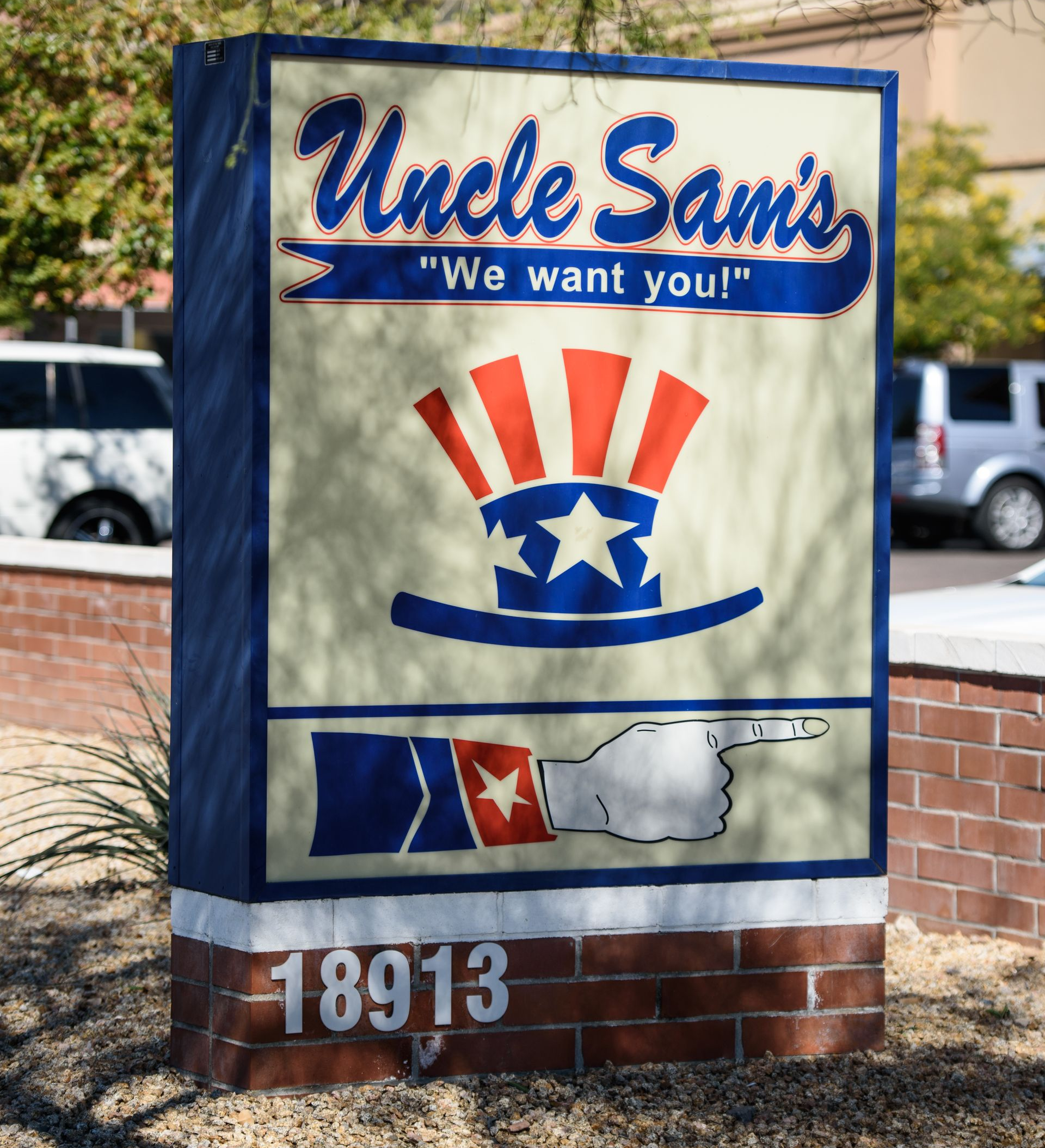 Uncle Sam’s restaurant sign with patriotic red, white, and blue graphics and address 18913
