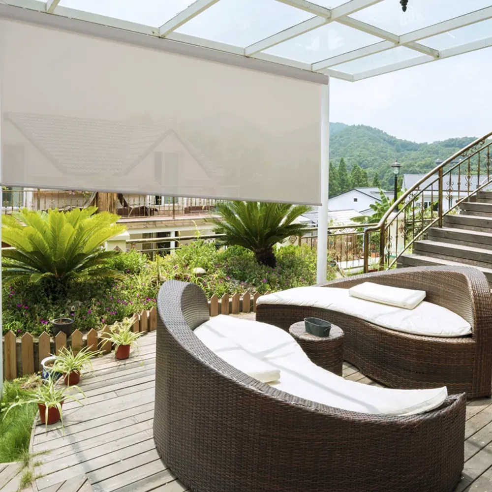 Patio with two wicker lounge chairs, a roll-down shade, plants, and a staircase leading to a mountain view.