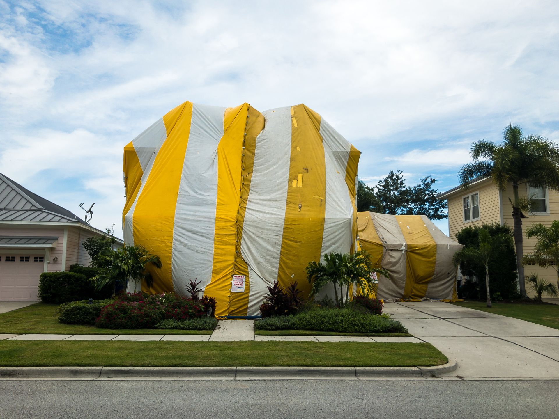 A house covered with a tent for fumigation.