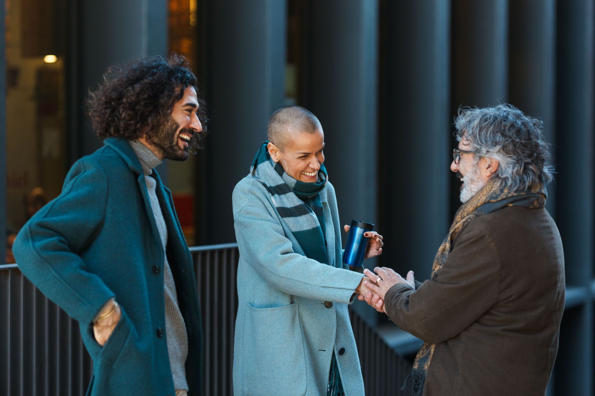 Lawyers talking outside a courthouse, representing law firm website design agencies.