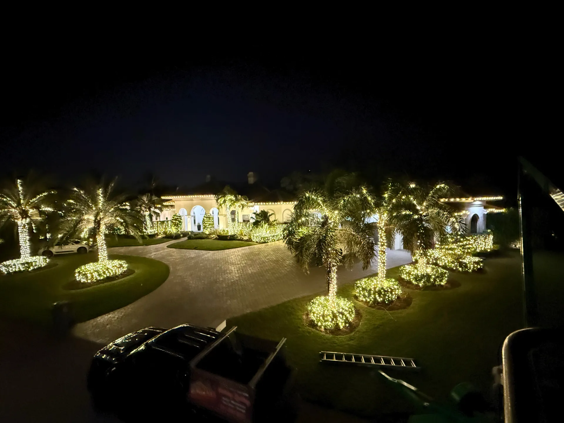 Holiday lighting installation for estate properties in South Florida.