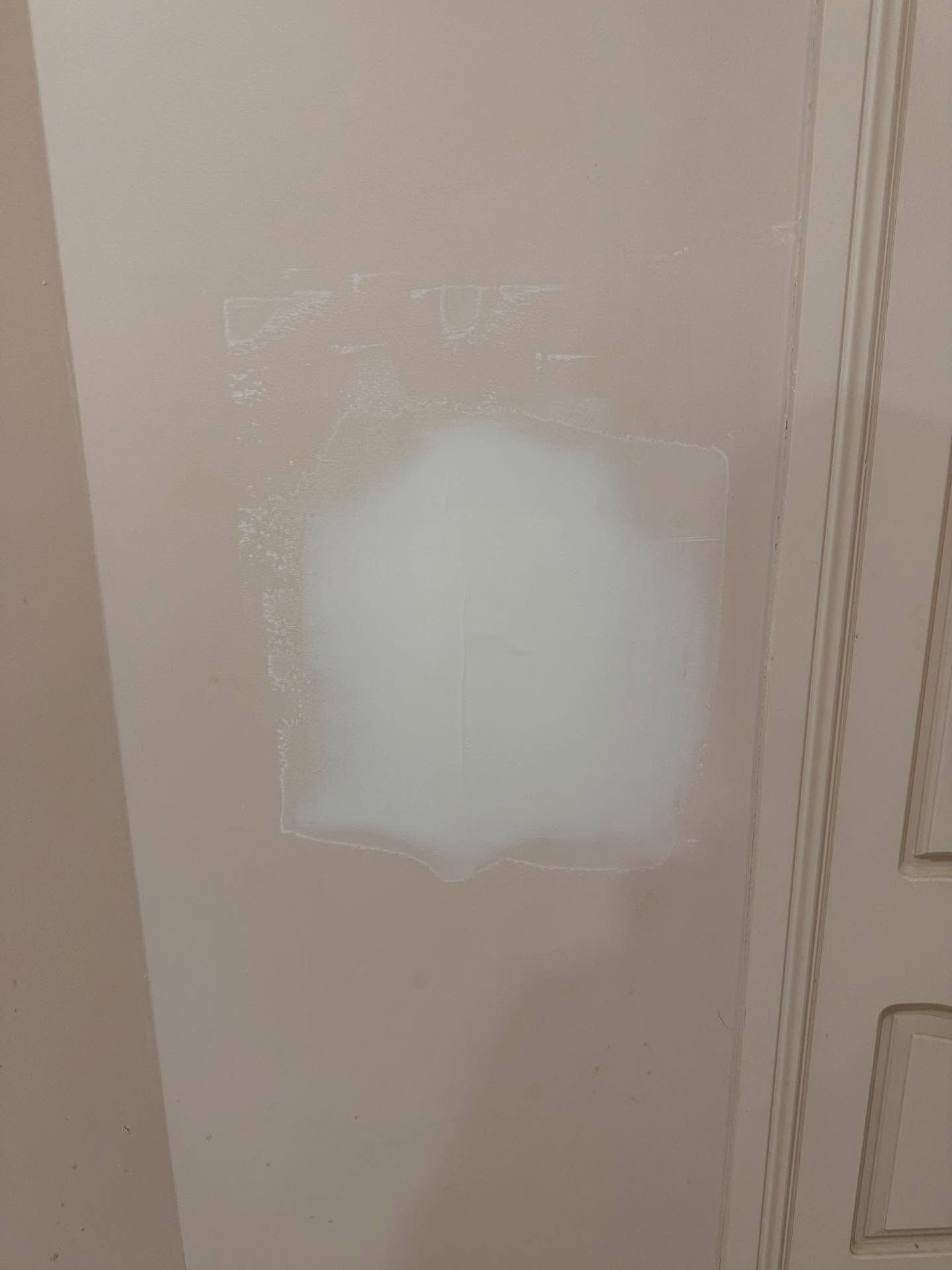 A Close Up of a White Wall Next to a Door — JOA - Construction & Maintenance Pty Ltd in Appin, NSW