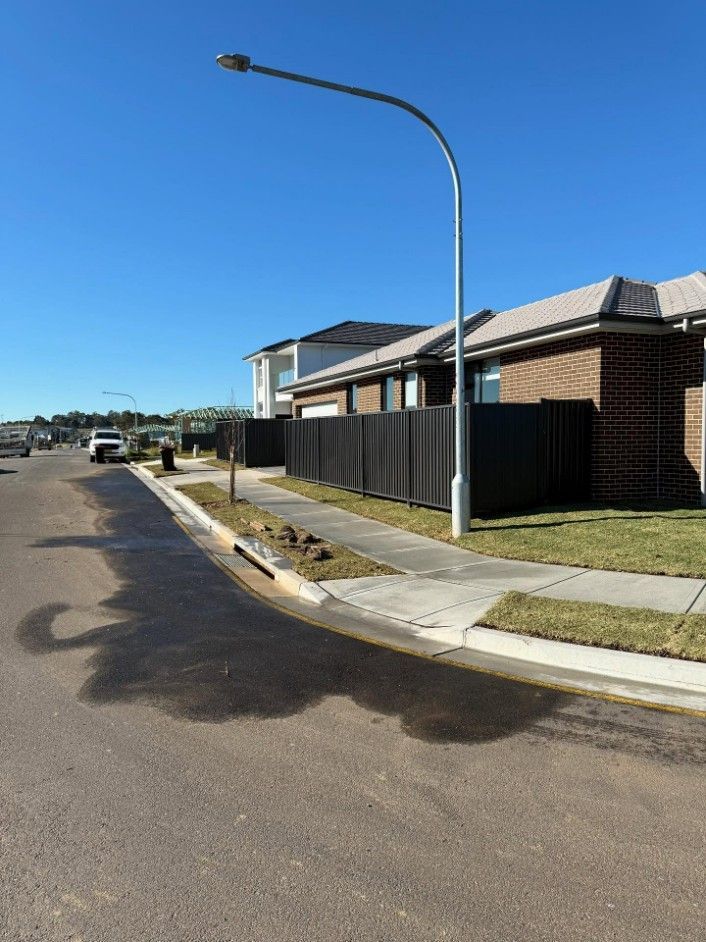 A Street Corner in a Residential Area — JOA - Construction & Maintenance Pty Ltd in Appin, NSW